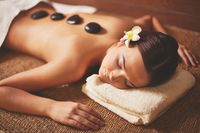woman-enjoying-stone-massage